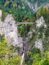 To find the famous view of neuschwanstein castle (you know, the one on all the postcards and pinterest boards), you'll need to head to marienbrücke (queen mary's bridge). Tourists Stand On Marienbruecke Marie S Bridge Near Neuschwanstein Stock Photo Picture And Royalty Free Image Image 92351205