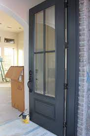 We plan to paint the doors. Timeless Paper Blog Archive House Update Front Door Fireplace Mantel Chandeliers House Design House Colors Updating House