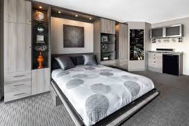 Get the best of both worlds: Custom Wall Beds In The Main Living Area Are Becoming More Of A Trend As Homeowners Multi Purpose Their Living Room To House Occas Wall Bed Murphy Bed Bed Wall