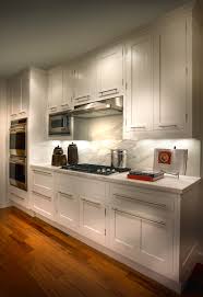 Calacatta Backsplash Is Featured In This Sleek Kitchen With White Cabinets And Silver Hardware Connecticutstone Sleek Kitchen Kitchen Design Kitchen Remodel