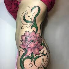 Lotus flower tattoos look great on the back, especially with a dot work. 132 Astounding Lotus Flower Tattoo Designs You Would Like To Have