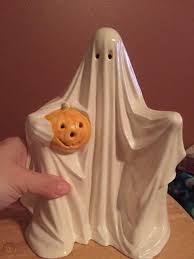 This halloween decoration features a smiling bow tie wearing ghost holding pumpkins that spell boo. Ceramic Halloween Ghost Holding Pumpkin Figure Vintage Byron Mold 1835503445