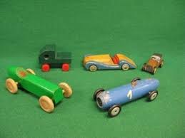 toy cars mainly with wooden wheels