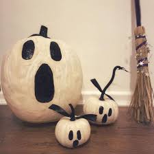 Scary pumpkins with painted faces, lights of burning candles in horror smoke. 60 Easy Pumpkin Painting Ideas For Halloween Fall 2020