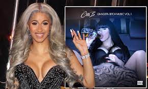 Cardi B in $5M suit over sex act simulated on album cover | Daily Mail  Online