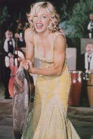 Stick a fork in madonna's new flick, it's done. Swept Away By Madonna Madonna Madonna Movies Madonna Hair