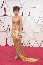In 2015, she released her debut album, cheers to the fall. Andra Day S Gold Metal Oscars 2021 Gown Academy Awards Red Carpet