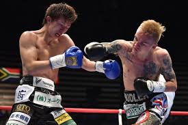 Taguchi's boxing history bid ended by 'Hexecutioner' - The ...
