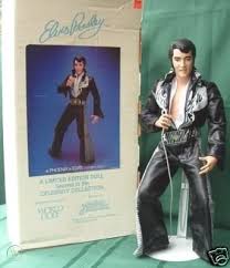 Elvis Presley 21 World Doll Phoenix Jumpsuit With Box 76922487 A doll that has been removed, but is in perfect condition & put back into the original box is considered mint.