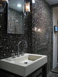 Available in hundreds of colours, from deep black to pearly green, our tile collections can serve as standout pieces or a subtle luxury touch, and add stunning interior design to your walls and floors at a competitively low price. Bathroom Black Tile Wall Novocom Top