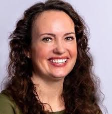 Sister Dianne McFall meeting president Kimball during his visit for temple  deductions and mission conferences. She is the current sister Swain.