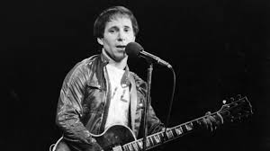 His hair color is brown and his eye color is brown. Author Robert Hilburn Shares Stories And Revelations Inside Paul Simon The Life World Cafe Npr