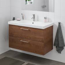 In my case i hung the vanity cabinet and plumber set the sink after he installed the faucet to it. Godmorgon Odensvik Sink Cabinet With 2 Drawers Brown Stained Ash Effect Dalskar Faucet 40 1 2x19 1 4x25 1 4 Order Here Ikea