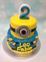 Scarlet overkill armature & minion cake by op en top taart. This 2 Tier Minion Cake Is A Bit Different Love It Minion Cake Cake Birthday Cake