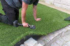 Man Installing Fake Grass Artificial Grass Installation Best Artificial Grass Installing Artificial Turf