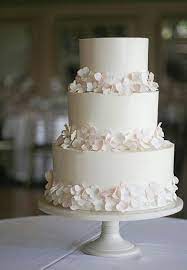 Smooth Buttercream 3 Tier Cake With Sugar Hydrangea Petals Erica Obrien Cake Design Unique Wedding Cakes Tiered Wedding Cake Simple Wedding Cake