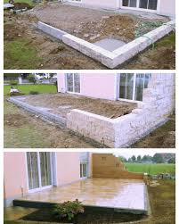 Terrasse Aus Travertin Mit Einer Umrandung Aus Granit Einem Angrenzenden Pflanzbeet Und Einer Integrierten Sichtschutzmauer Travertine Terrace Granite
