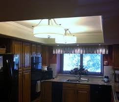 The first option is to keep the soffit open; Some Simple Tlc Give Some Added Warmth And Design Cohesiveness To A Kitchen Lighting Remod Kitchen Recessed Lighting Fluorescent Kitchen Lights Updated Kitchen