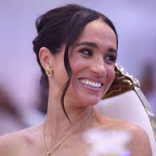 Meghan Markle just wore the perfect summer holiday dress in her 44th  birthday post. See the photos and shop the look at the link in the comments.