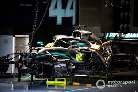 The Car Of Lewis Hamilton Mercedes Amg F1 W10 In The Garage Mercedes Amg Lewis Hamilton Amg