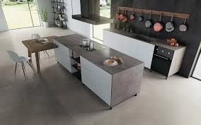 The bespoke kitchen features a huge slab of black granite work surface with a tactile brushed finish. Porcelain Tile Maintenance How To Clean Them Easily