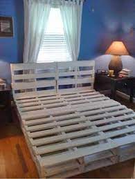 18 gorgeous diy bed frames the budget decorator diy pallet bed pallet bed frame diy making a bed frame