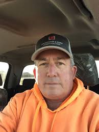 How to fix a poorly installed concrete slab with expansion joint against  the foundation?