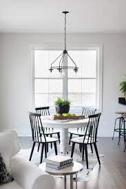 Dining table and chairs dark pine and white with extending table canterbury. Pairing Black Windsor Chairs With A Round White Pedestal Dining Table Binds An Antique Round Pedestal Dining Table White Round Kitchen Table White Dining Table