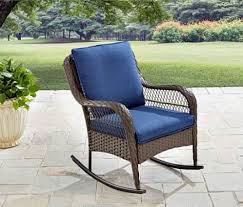 This resin wicker and eucalyptus rocking chair is made from sustainable Outdoor Brown Wicker Rocking Chair Blue Cushions Patio Rattan Garden Furniture Bhgdealsmarket Outdoor Rocking Chairs Wicker Rocking Chair Rocking Chair