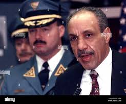 Col. Carson J. Dunbar Jr., right, New Jersey State Police superintendent,  announces during a news conference at State Police offices in Totowa, N.J.,  Tuesday, Feb. 8, 2000, the seizure of cocaine and