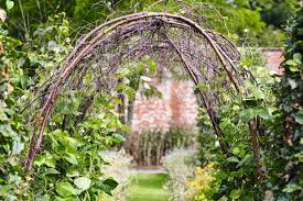 How To Make Arbours And Tunnels Using Natural Materials Diy Garden Trellis Garden Arch Trellis Willow Garden