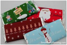 I used photo mounting squares to adhere, but you could also use double sided tape. Christmas Chocolate Bar Wrappers