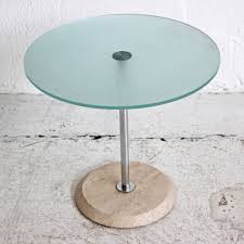 The oval frosted glass of this coffee table is what sets it apart from other contemporary furniture pieces. Round Frosted Glass With Concrete Base Glass Coffee Table Small Coffee Table