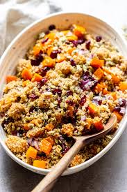 With butternut squash, oranges and cranberries. Butternut Squash And Cranberry Quinoa Salad Little Broken