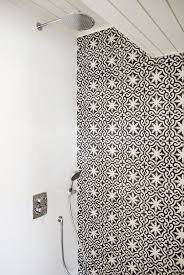Shower Wall With Moroccan Tiles Concrete Wall Scandinavian Interior Bathroom Moroccan Interiors Moroccan Tiles White Moroccan Tile