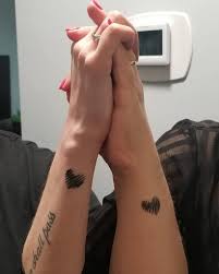 Isn't this a cute and simple heart tattoo on wrists? Top 71 Best Small Heart Tattoo Ideas 2021 Inspiration Guide