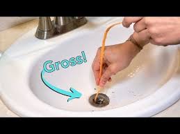 Remove hair from sinks & showers: Video Tutorial See How To Take Out A Bathroom Sink Stopper And Clean The Drain See Tools To R Bathroom Sink Drain Stopper Bathroom Sink Stopper Bathroom Sink