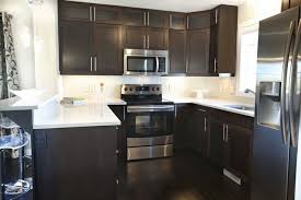 white quartz counters with dark brown