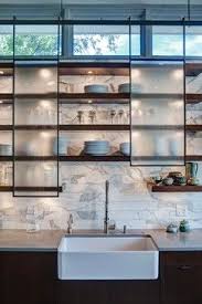Amazing gallery of interior design and decorating ideas of sliding glass kitchen cabinets in decks/patios, pools, laundry/mudrooms, kitchens, entrances/foyers by elite interior designers. Contemporary Kitchen Apron Sink Design Ideas Pictures Remodel And Decor Contemporary Kitchen Cabinets Contemporary Kitchen Modern Kitchen