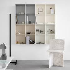 Shelves, standards (long vertical slotted strips fastened to the wall), and brackets that fit into grooves along the length of the standards. Shelving Shelving Systems High Quality Designer Shelving Architonic