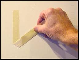 How To Hang Work With Tape