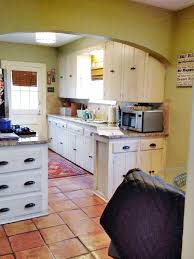 The refrigerator was in the way and only one person could use the kitchen comfortably. Cape Cod Makeover Better Homes Gardens