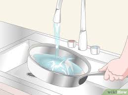 Baking soda and elbow grease. 3 Ways To Clean Grease Off Stainless Steel Wikihow