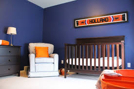 Here's a few baby boy nursery ideas to get started. Navy And Orange Dutch Nursery Project Nursery Nursery Room Boy Baby Boy Room Nursery Blue Nursery Decor