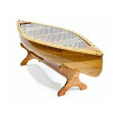 An authentic 5′ cedar canoe has been converted into a beautiful table with a full glass top and cherry. 5 Classic Canoe Coffee Table Rheaume Canoe
