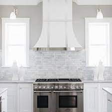 White French Range Hood With Stainless Steel Trim Small Bathroom Remodel Contemporary Kitchen Range Hood
