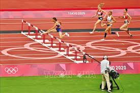 Vietnamese quách thị lan (right) competes in the women's 400m hurdles heat together with usa's sydney mclaughlin, denmark's sara slott petersen and panama's gianna woodruff (from left to right) during the tokyo 2020 olympic games on july 31. 52iwx8u5zfrf1m