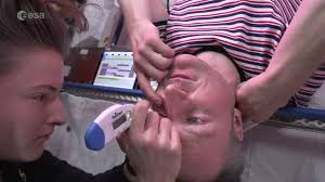 See an astronaut get an eye exam in space