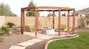 Use a tape measure to determine fire pit and pergola radius, mark the points (*materials specified are for a 4' fire pit radius and 12' pergola radius) tie a string and hold it tight. Fire Pits Designed By Az Living Landscape Call 480 390 4477