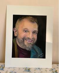 Happy with husband's portrait after years